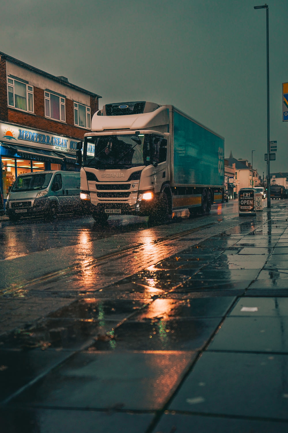 a truck on a wet street