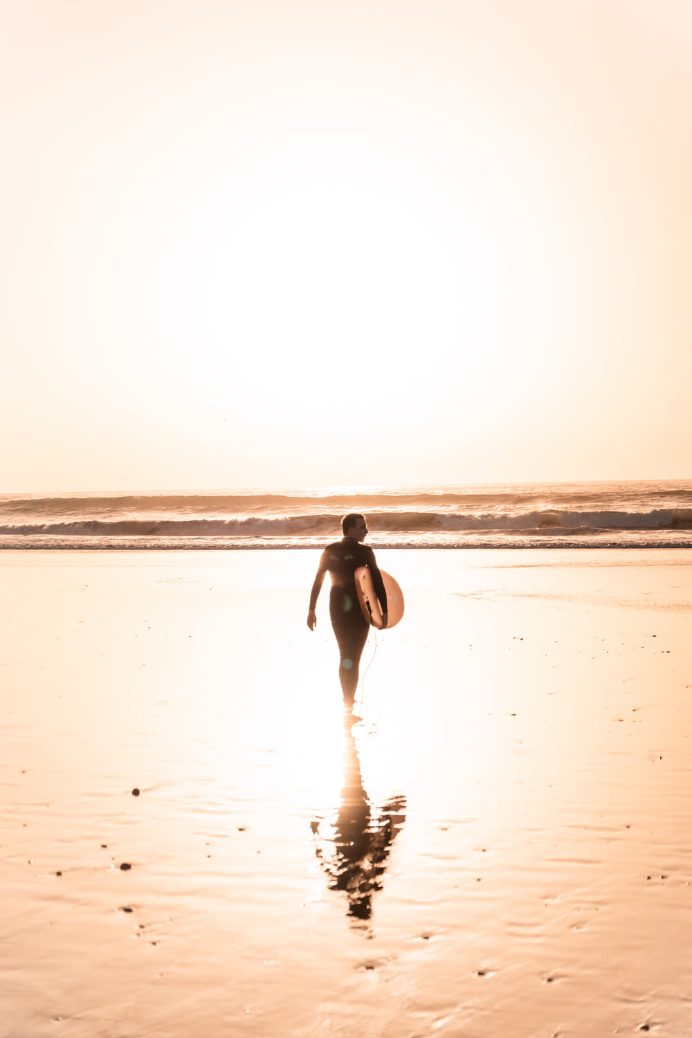 a person walking on a beach