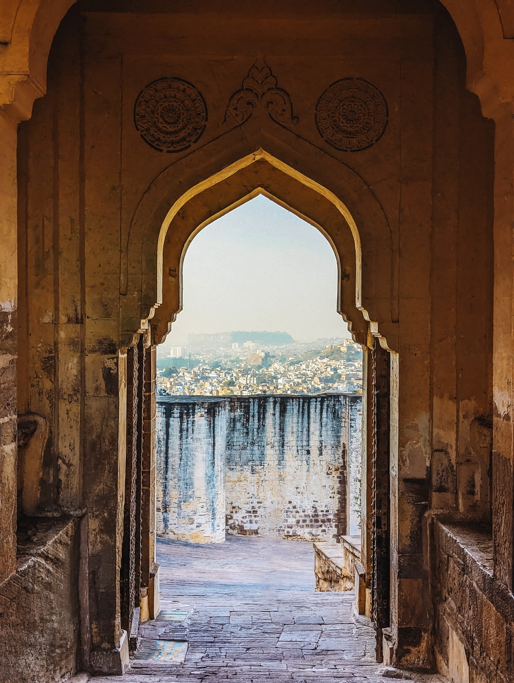 a doorway with a view of a city