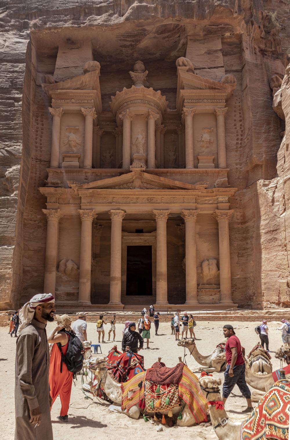 a group of people outside Petra