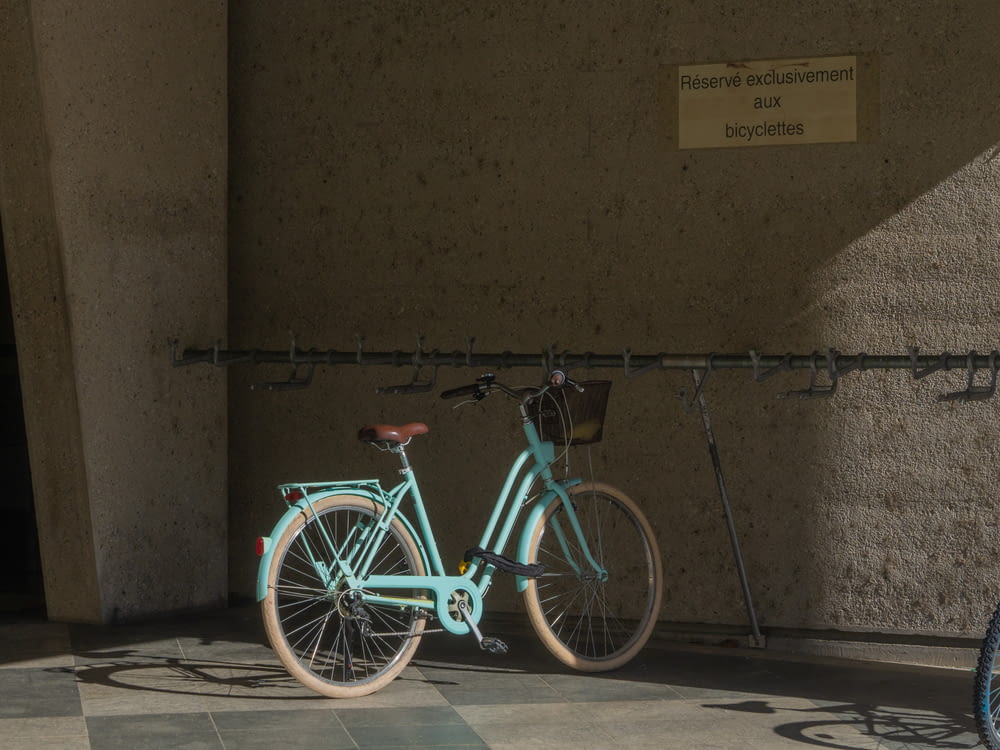 a bicycle parked on the sidewalk
