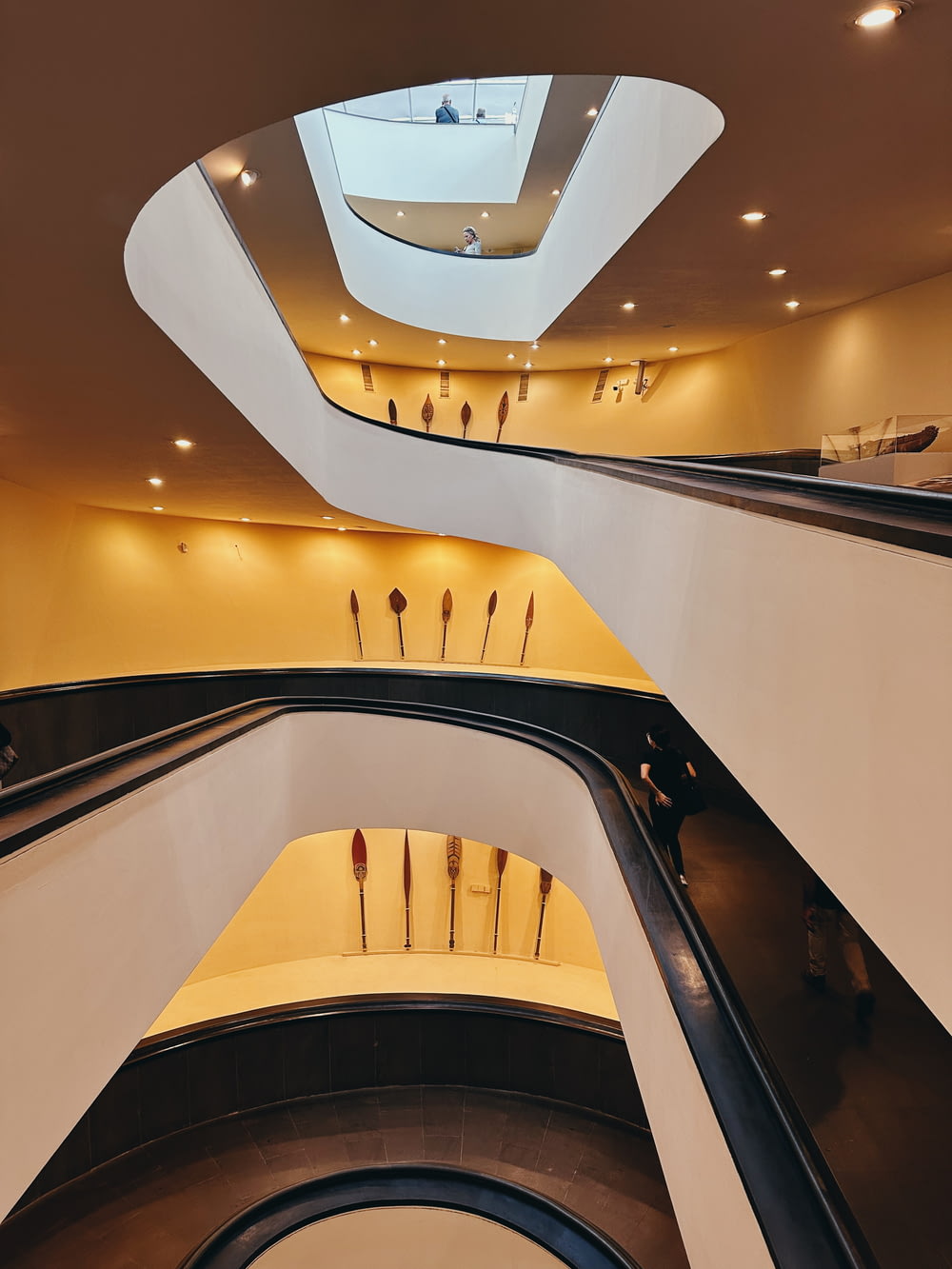 a view of an escalator in a building