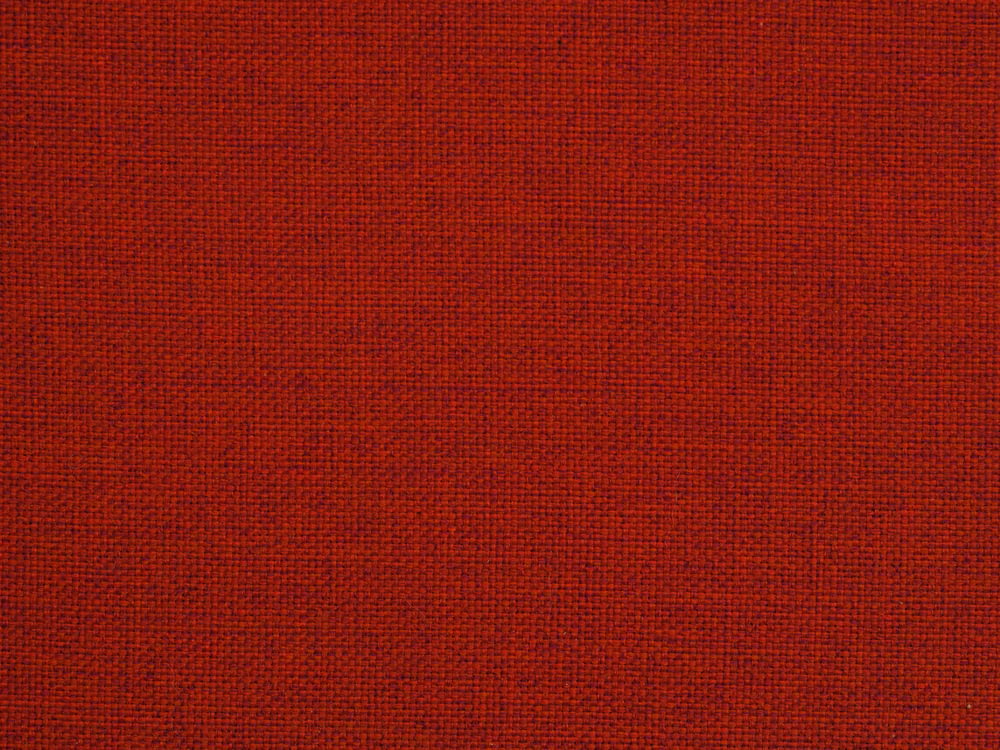 a close up of a red fabric texture
