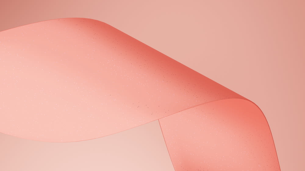 a pink background with a curved corner