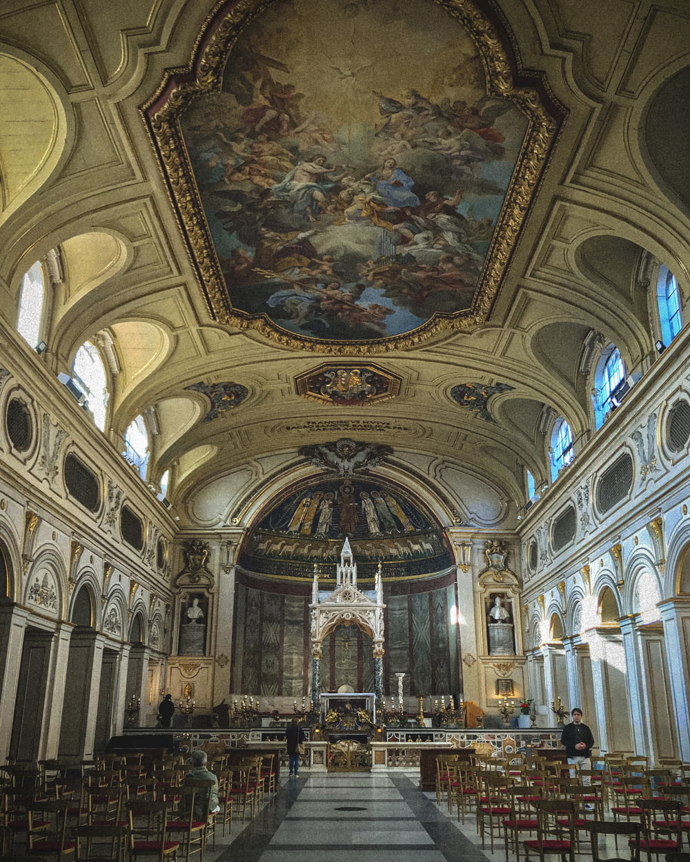 a church with a large painting on the ceiling