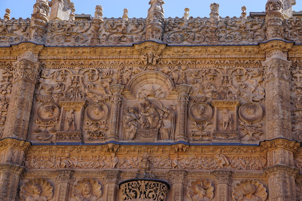 a large building with carvings on the side of it