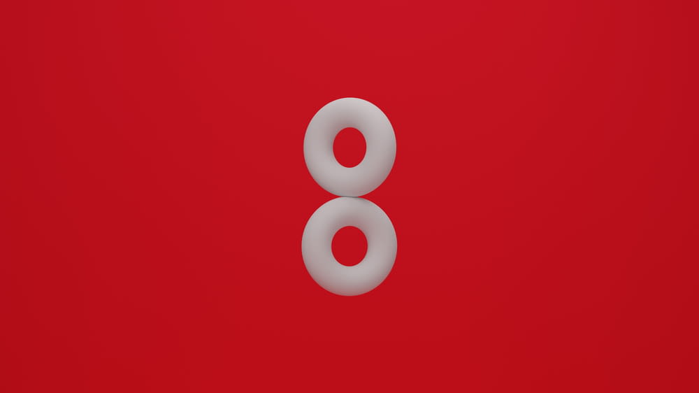 a number eight on a red background