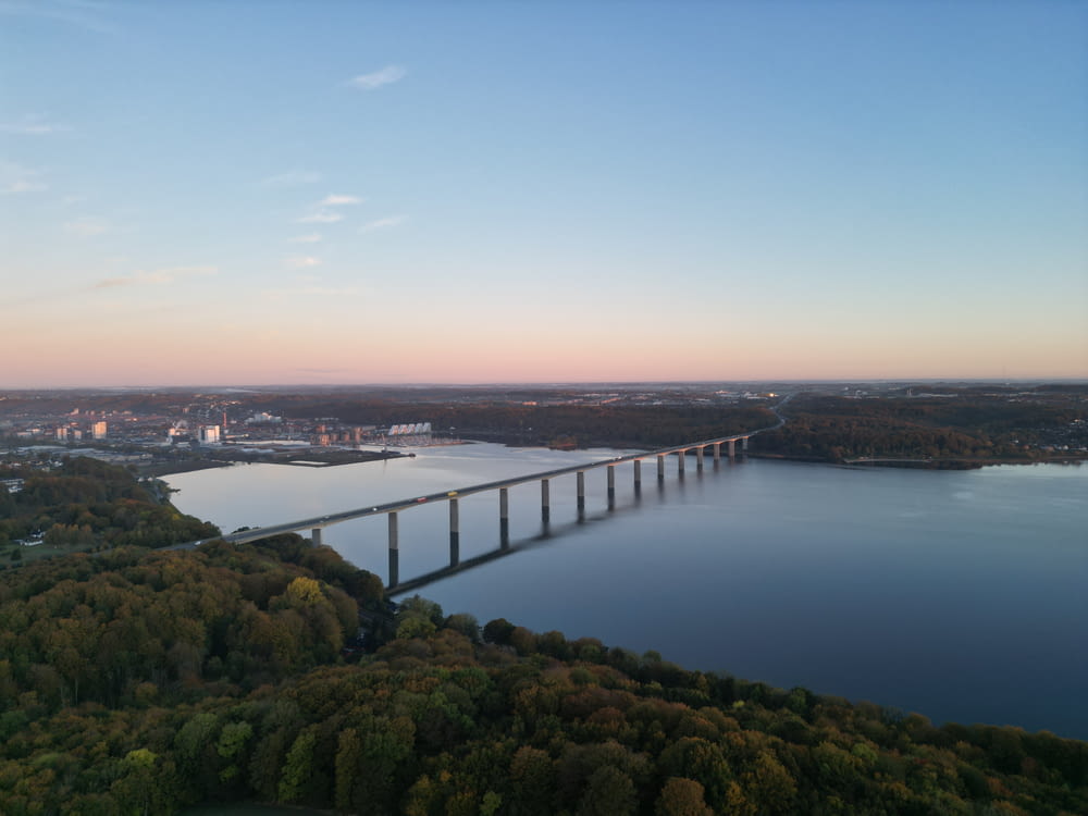 an aerial view of a bridge over a large body of water
