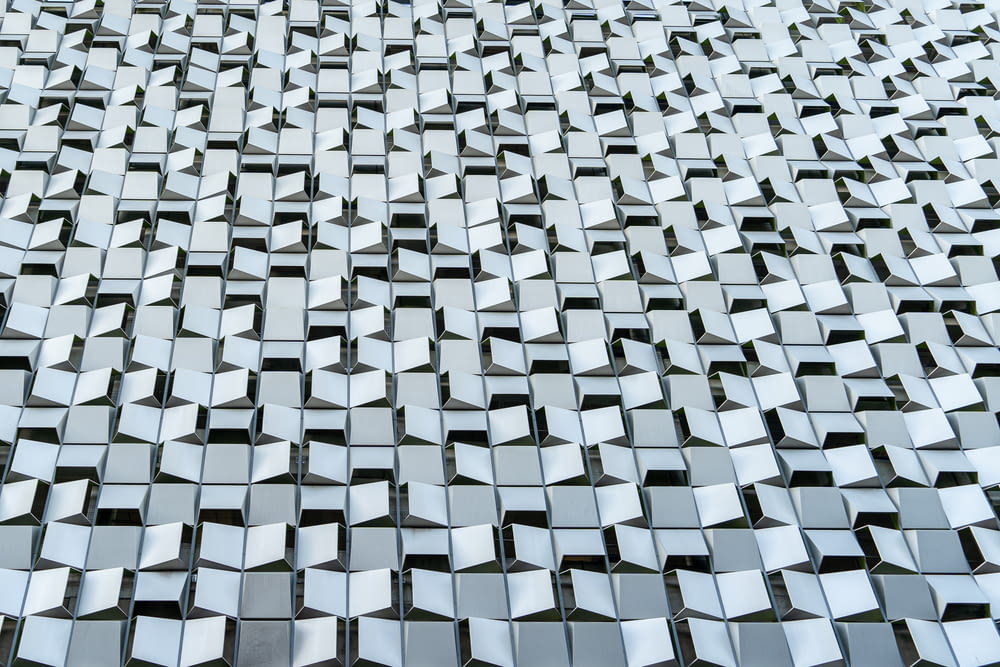 a close up of a wall made up of mirrors