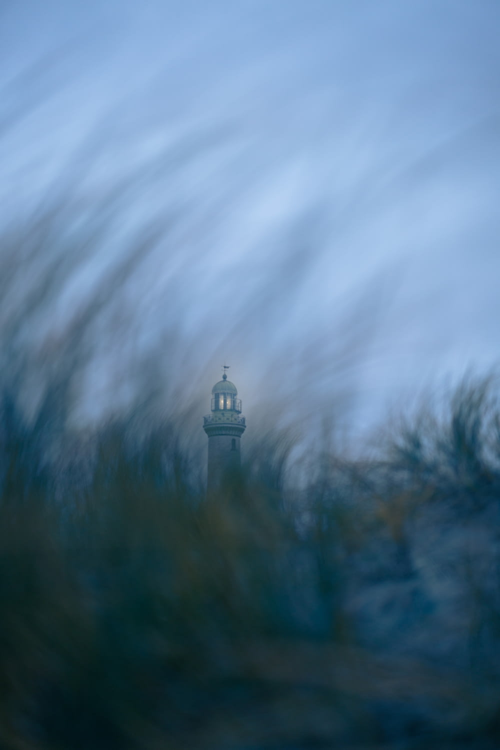 a blurry photo of a clock tower in the distance