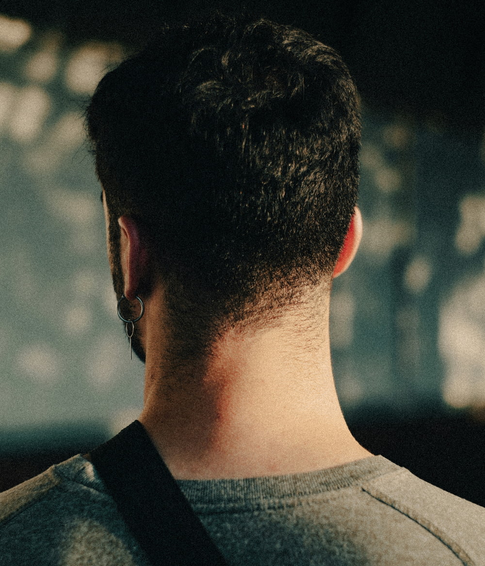 the back of a man's head and neck