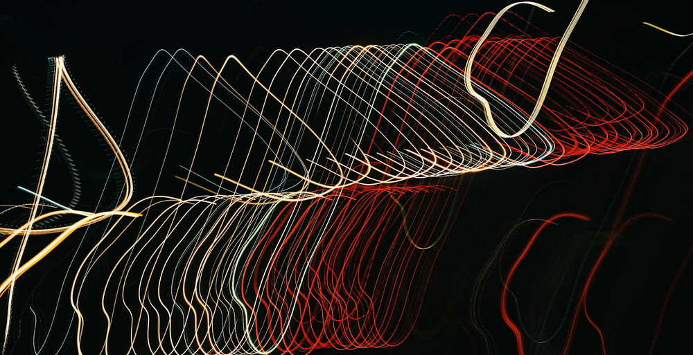 a blurry photo of a long exposure of lights