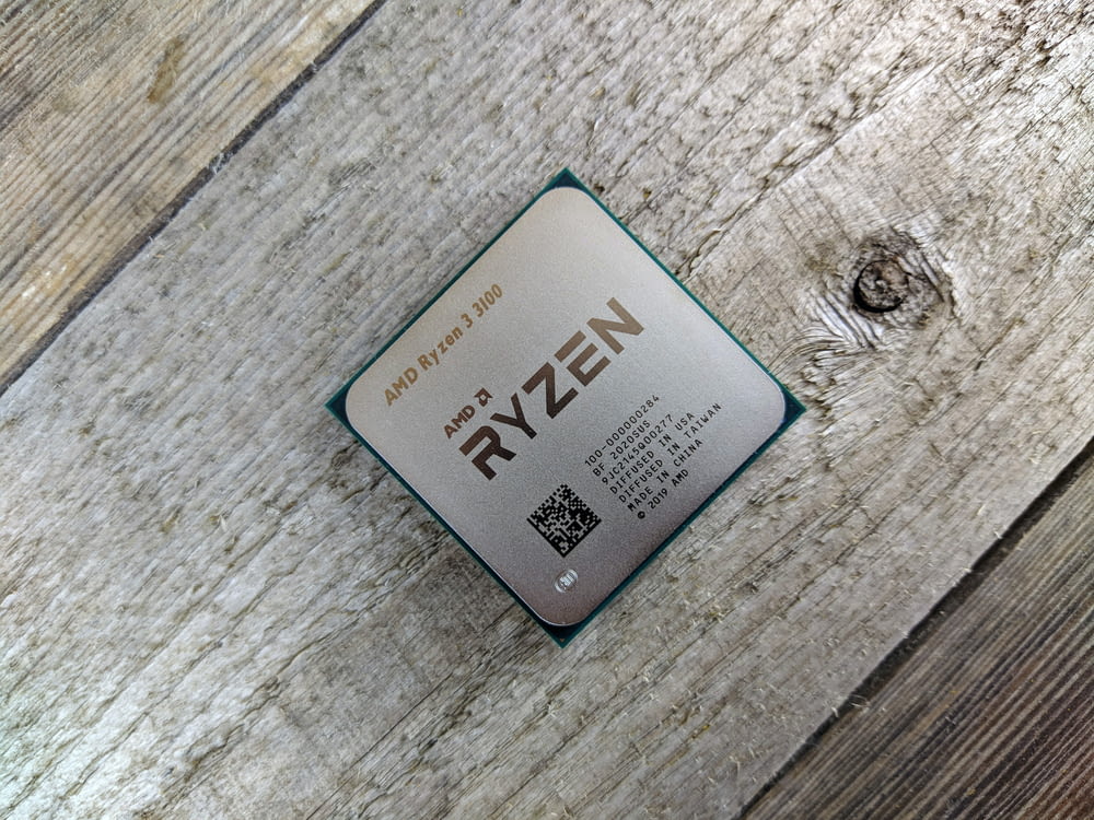 a close up of a cpu on a wooden surface