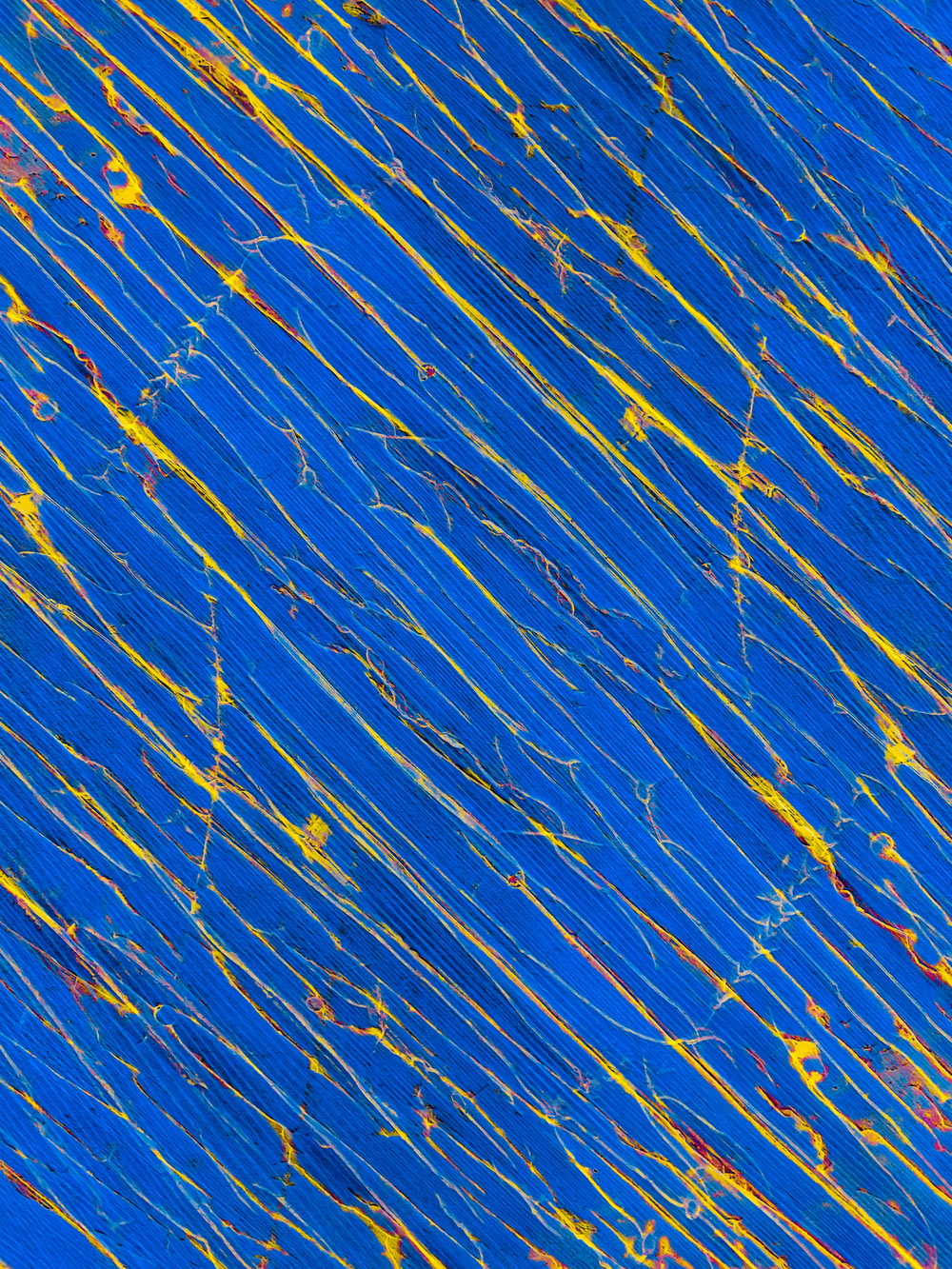 a blue background with yellow and red streaks