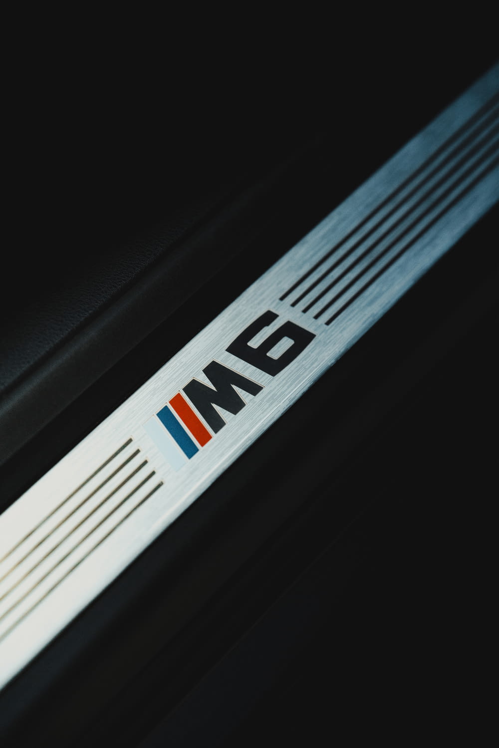 a bmw emblem is shown on the side of a car