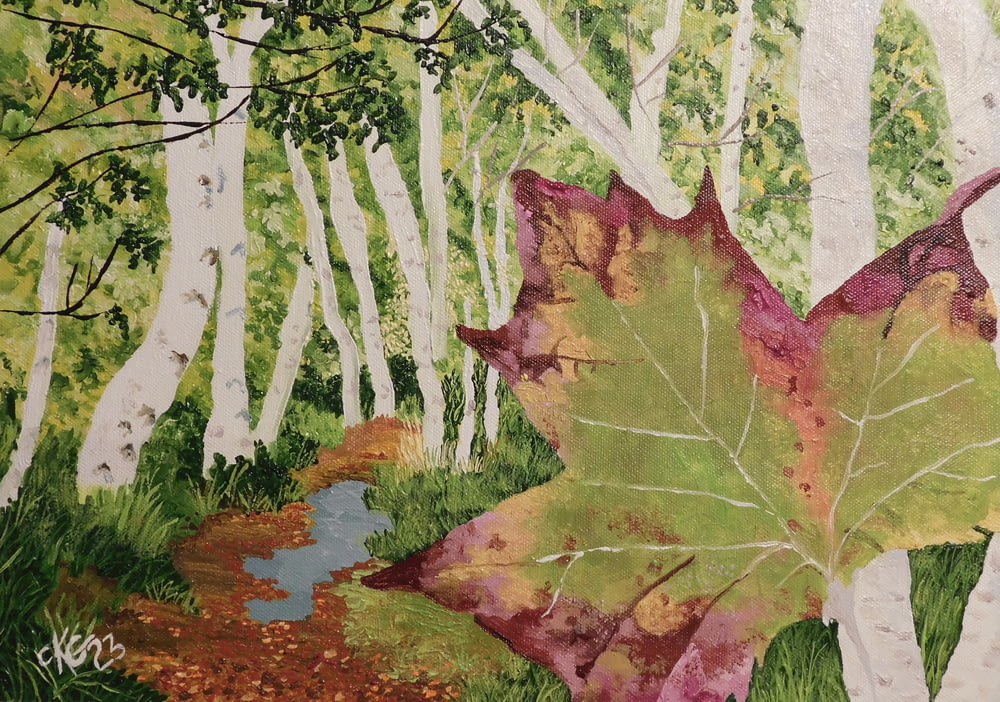 a painting of a leaf in the woods