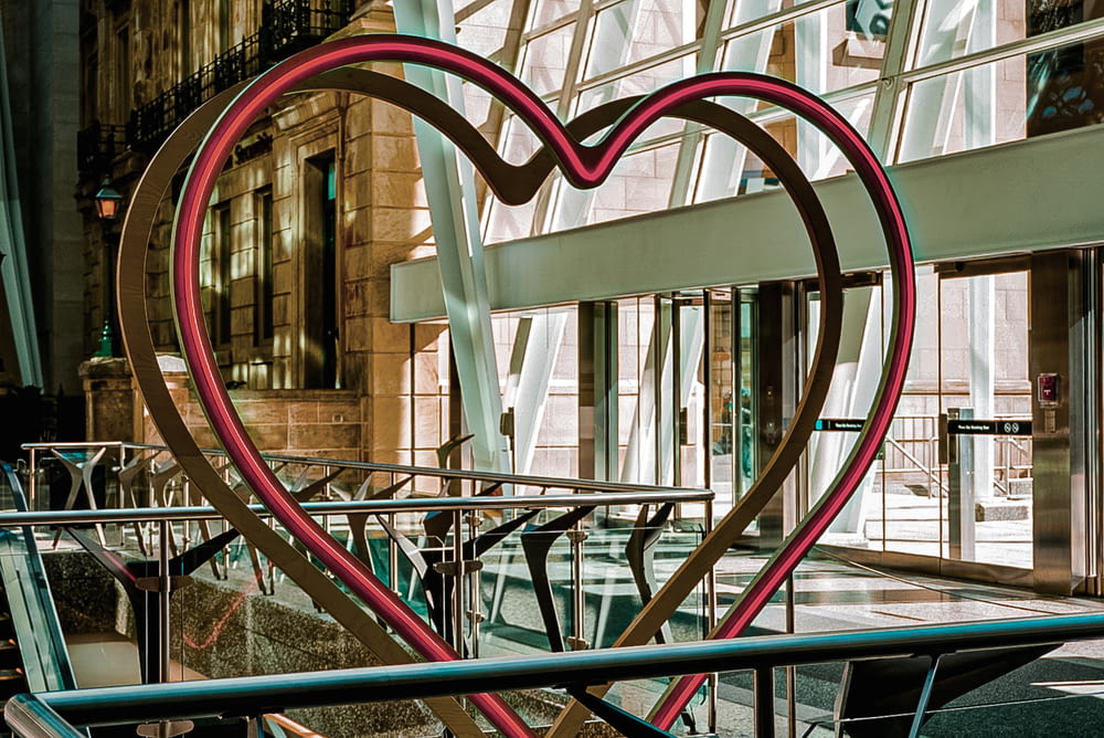 a large heart shaped sculpture in a building