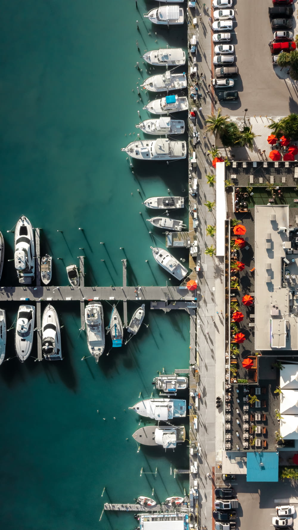 a marina filled with lots of boats next to each other