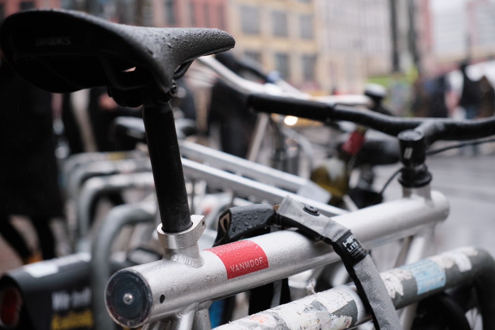 a close up of a bike rack on a city street