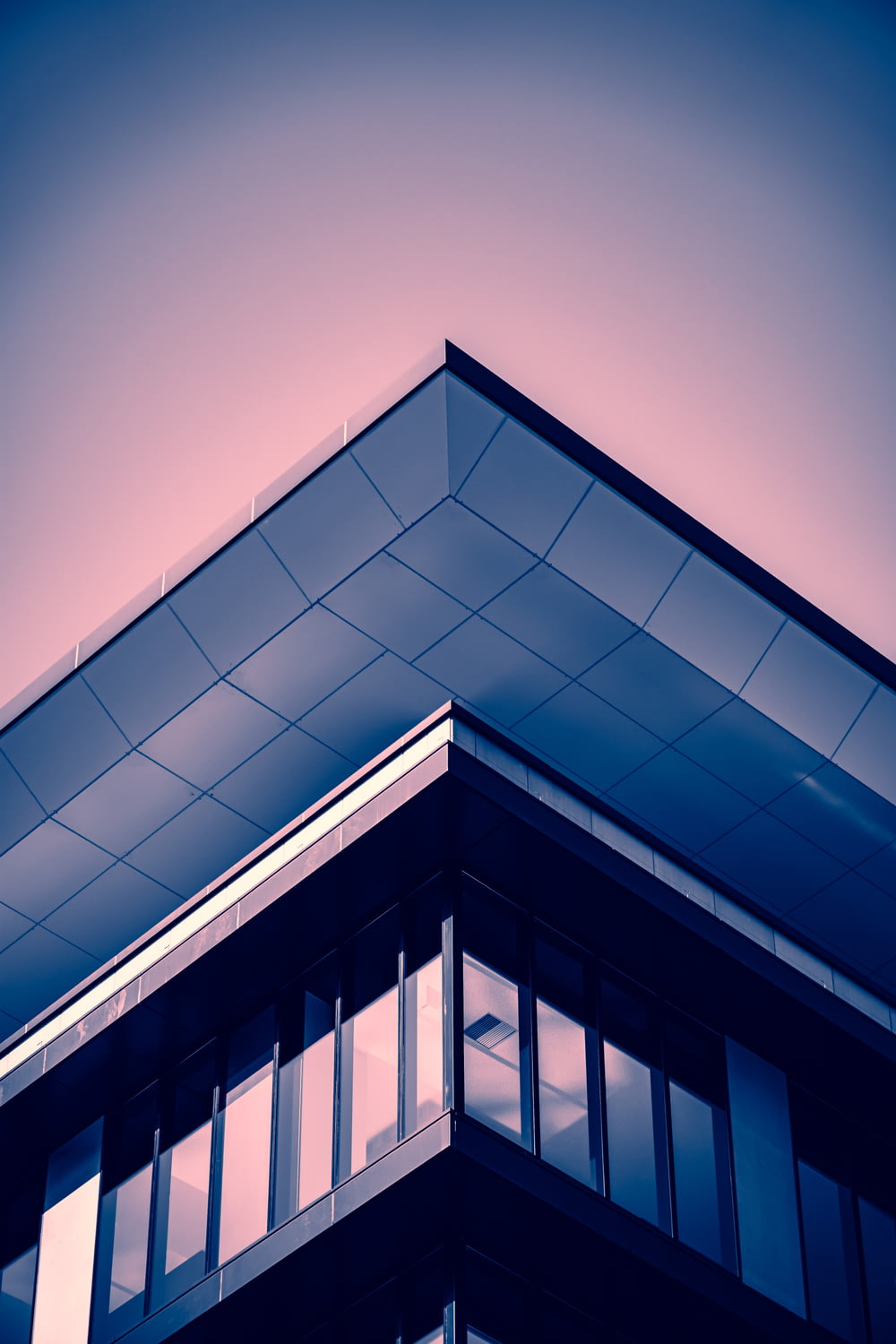 a close up of a building with a sky background