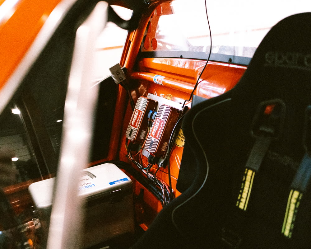 the interior of a truck with an orange interior