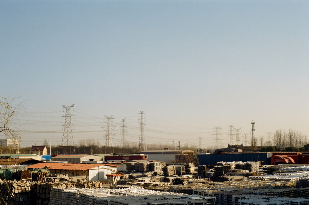 a view of a city with lots of power lines