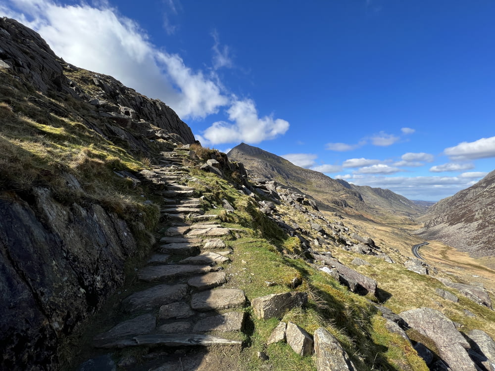 a stone path going up a mountain side