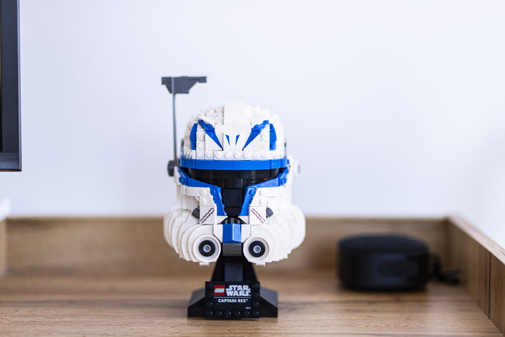 a lego star wars robot head on a desk