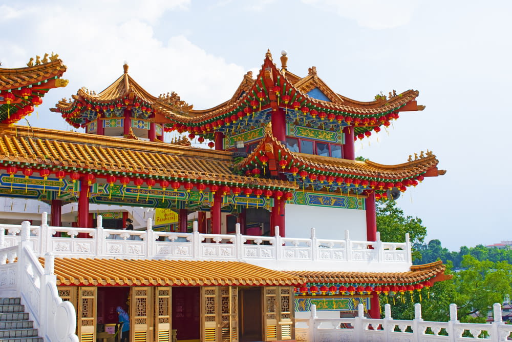 a chinese building with red and gold decorations