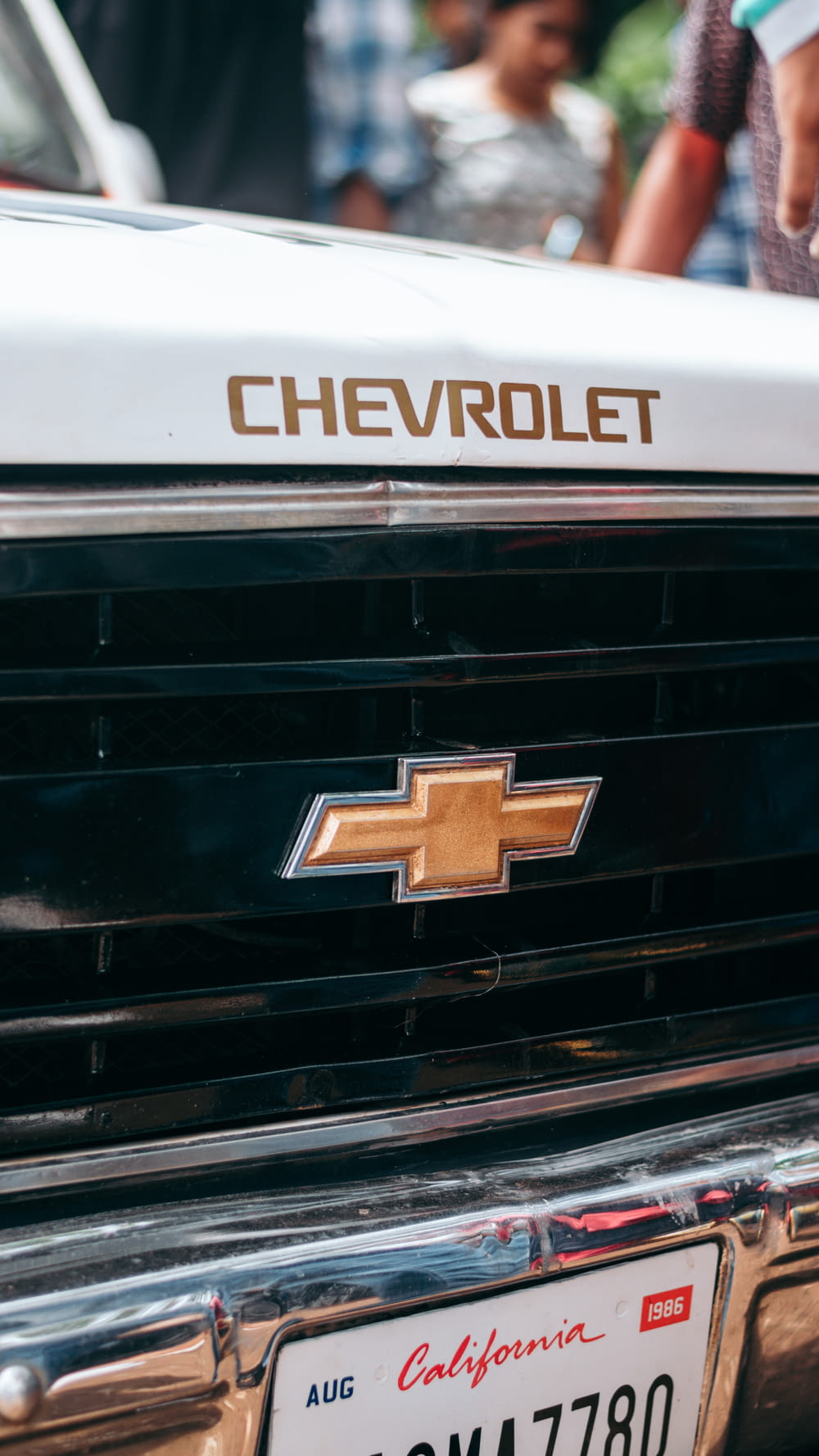 a close up of a chevrolet emblem on a car