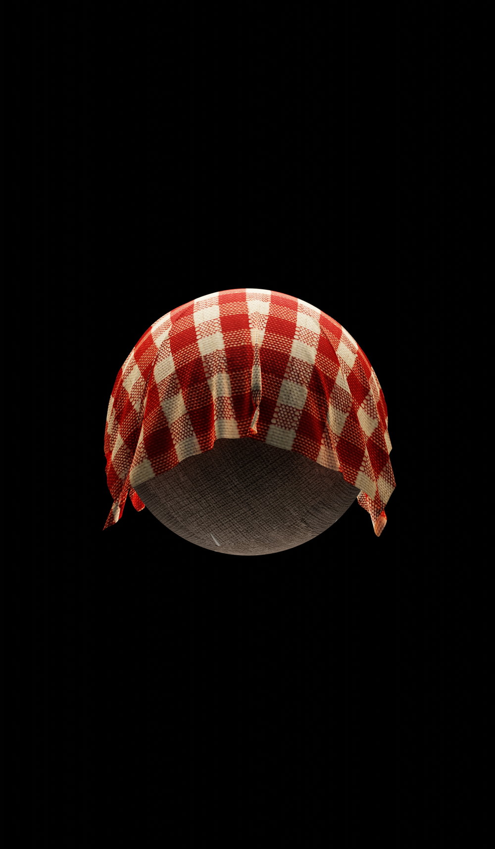 a red and white checkered hat hanging from a ceiling