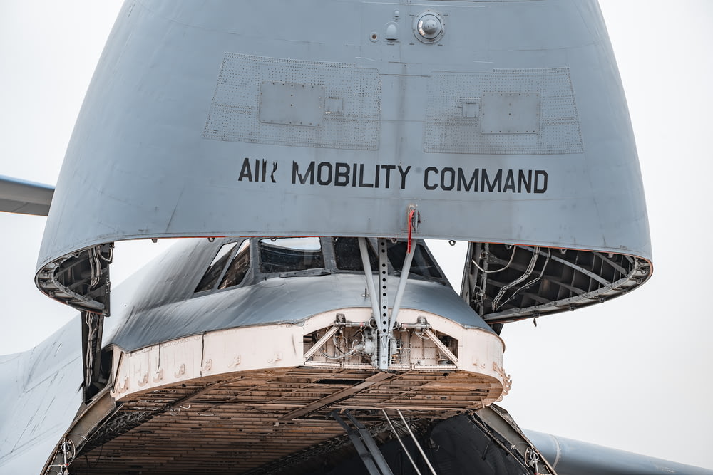 a close up of the side of an air mobility command plane