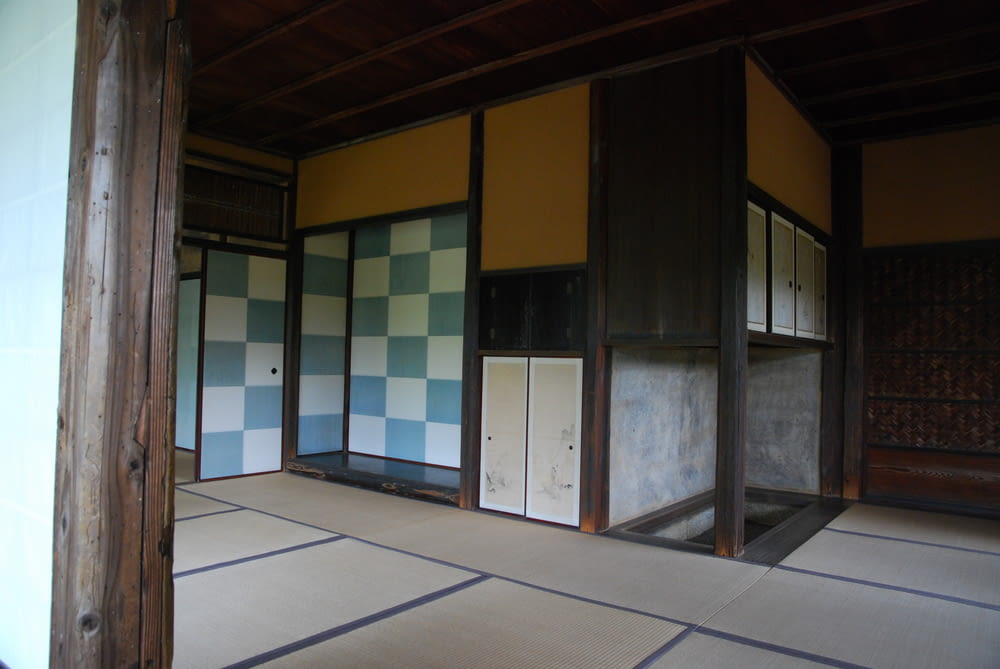 a room with a checkered floor and walls