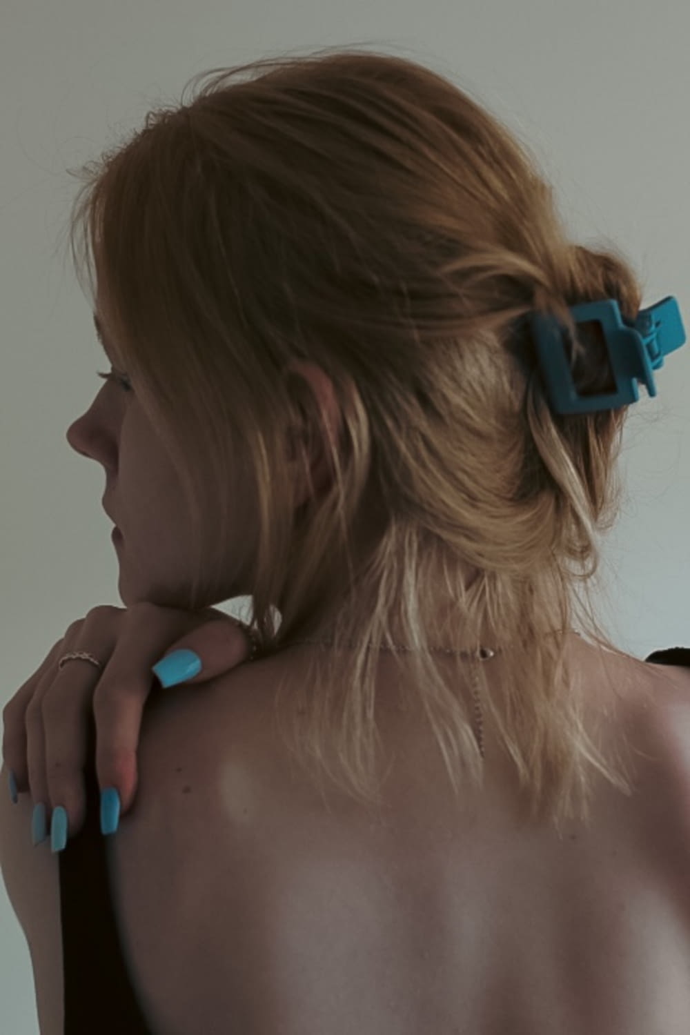 a woman with a hair clip in her hair