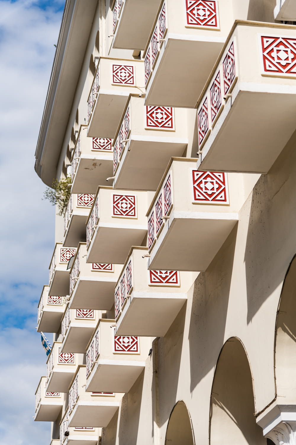 a building with red and white designs on it