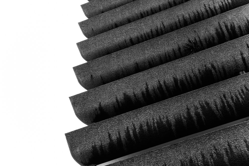 a close up of a set of black brushes