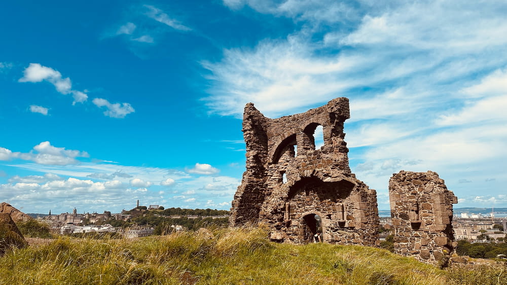 the ruins of an old building on a hill