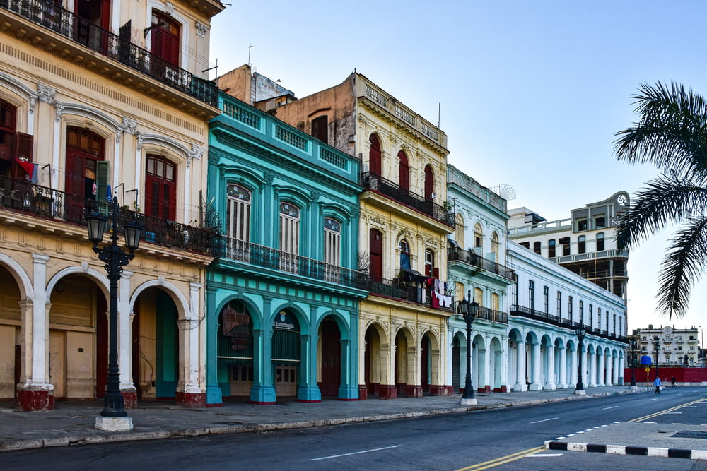 a row of colorful buildings on a city street