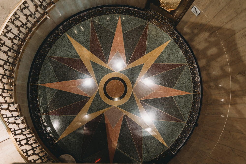 an overhead view of a circular table in a building