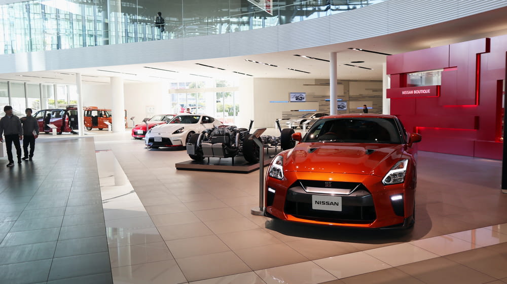 a car showroom filled with lots of cars