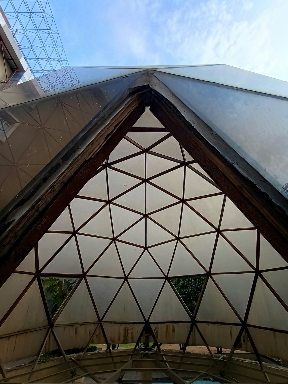 a triangular structure with a sky background