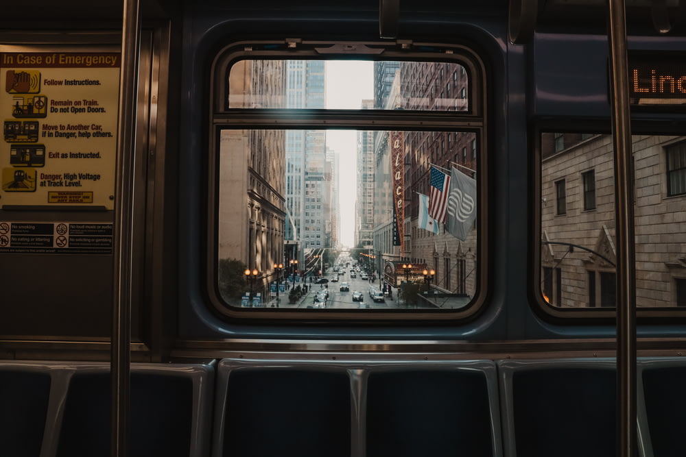 a view of a city street through a window