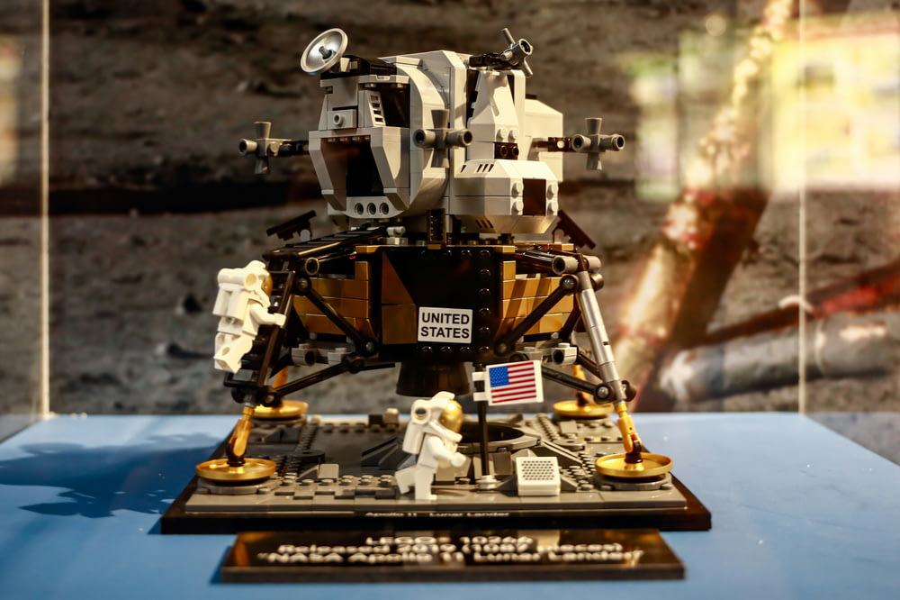 a lego model of a space station on display