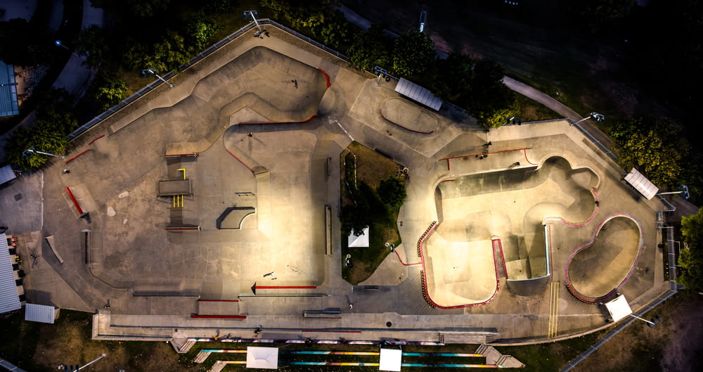 an aerial view of a skate park at night