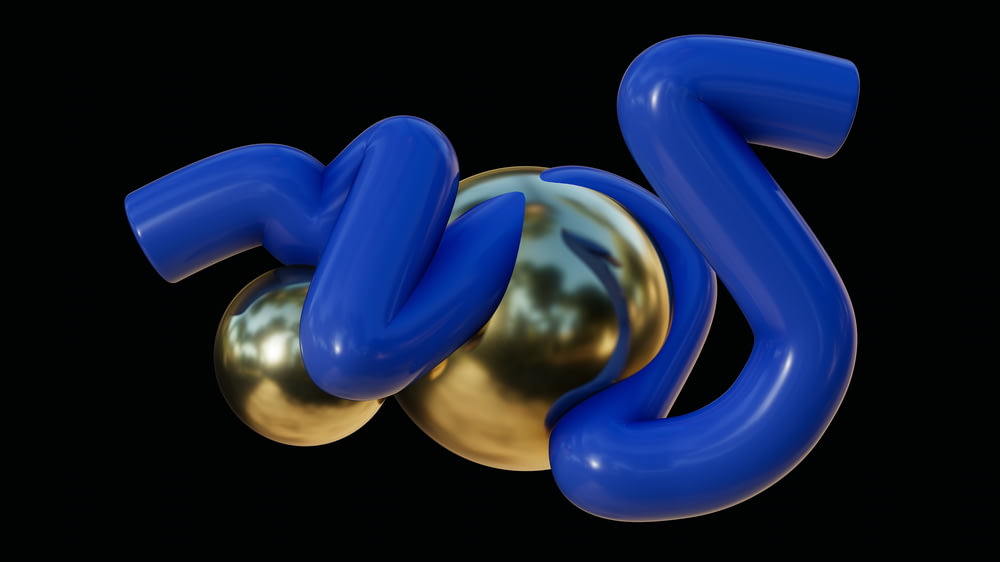 a gold and blue object with a black background