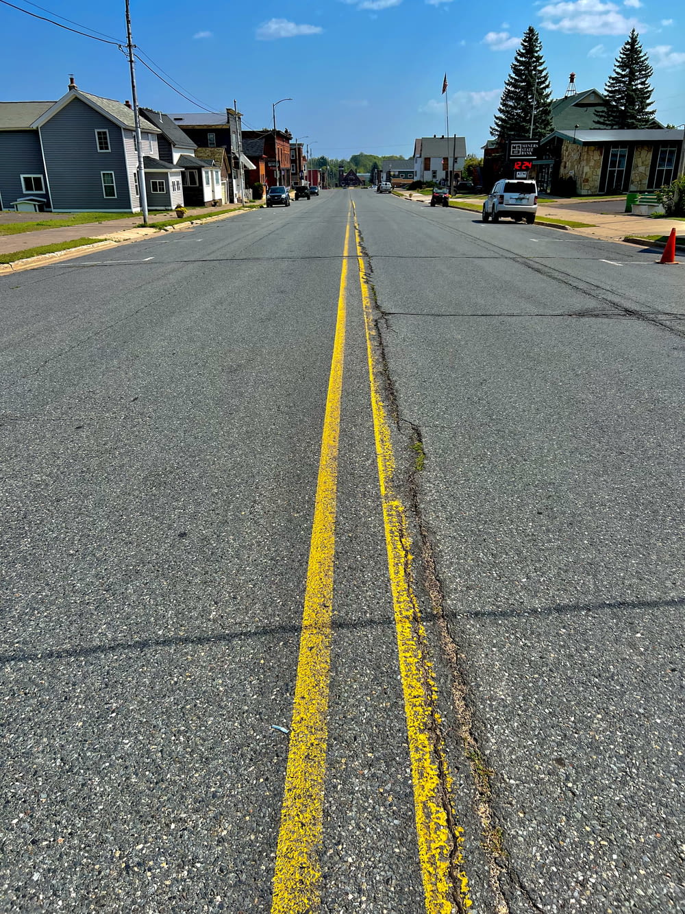 a street with a yellow line painted on it