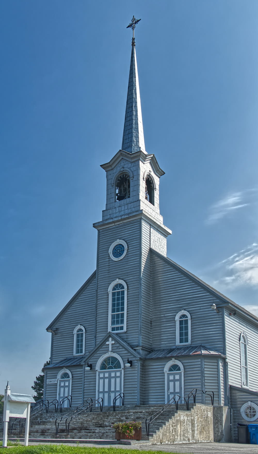 a church with a steeple and a clock tower