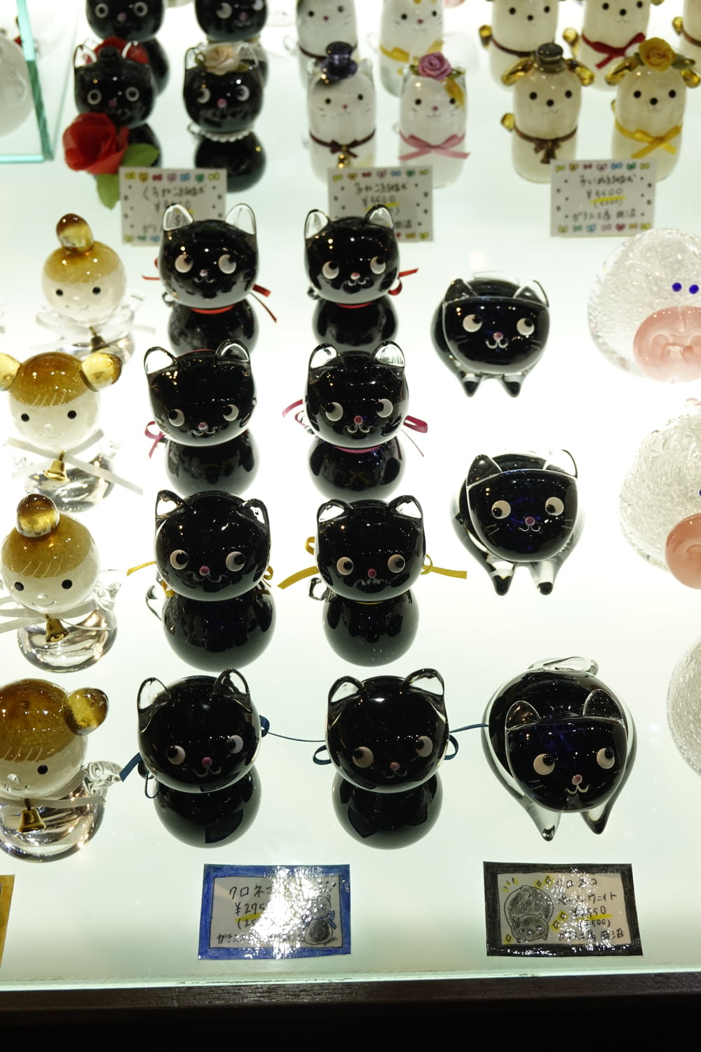 a display case filled with lots of black and white items