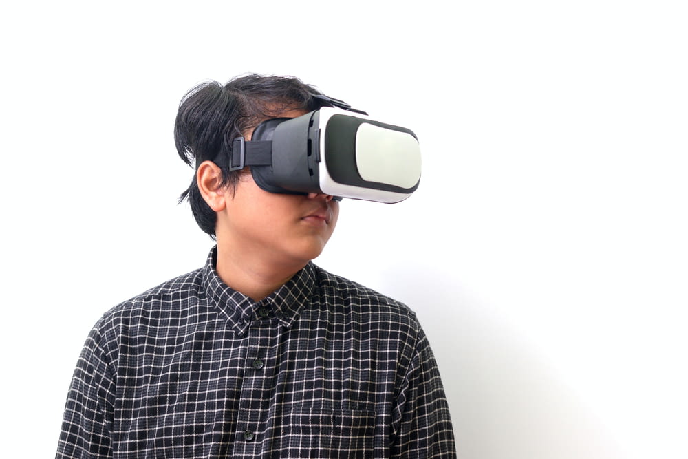 a man wearing a pair of virtual glasses