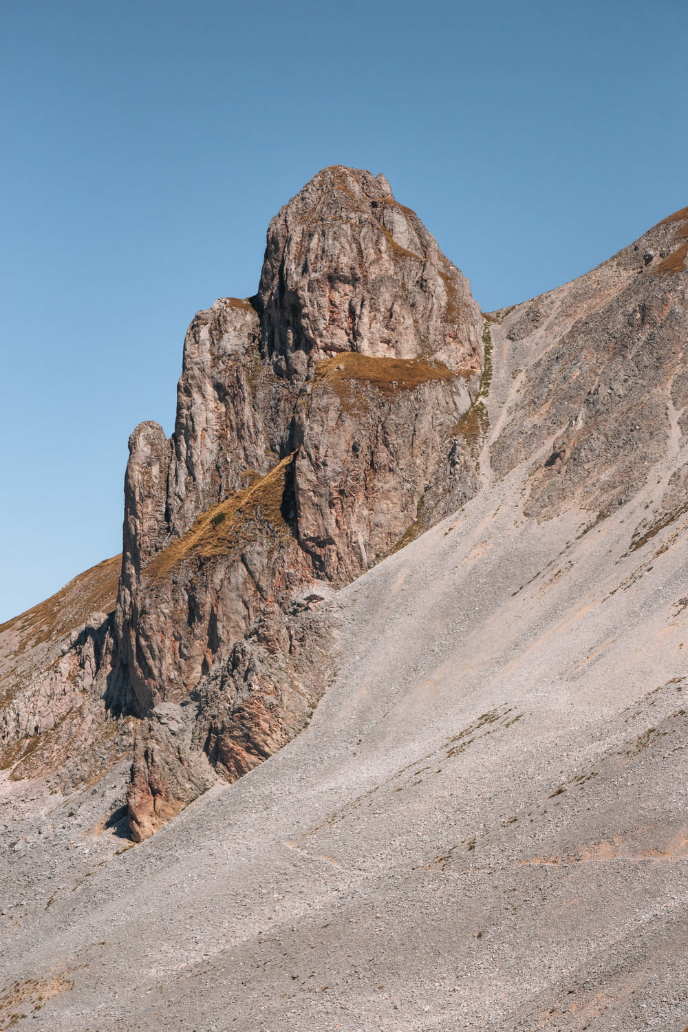 a mountain with a very tall rock formation